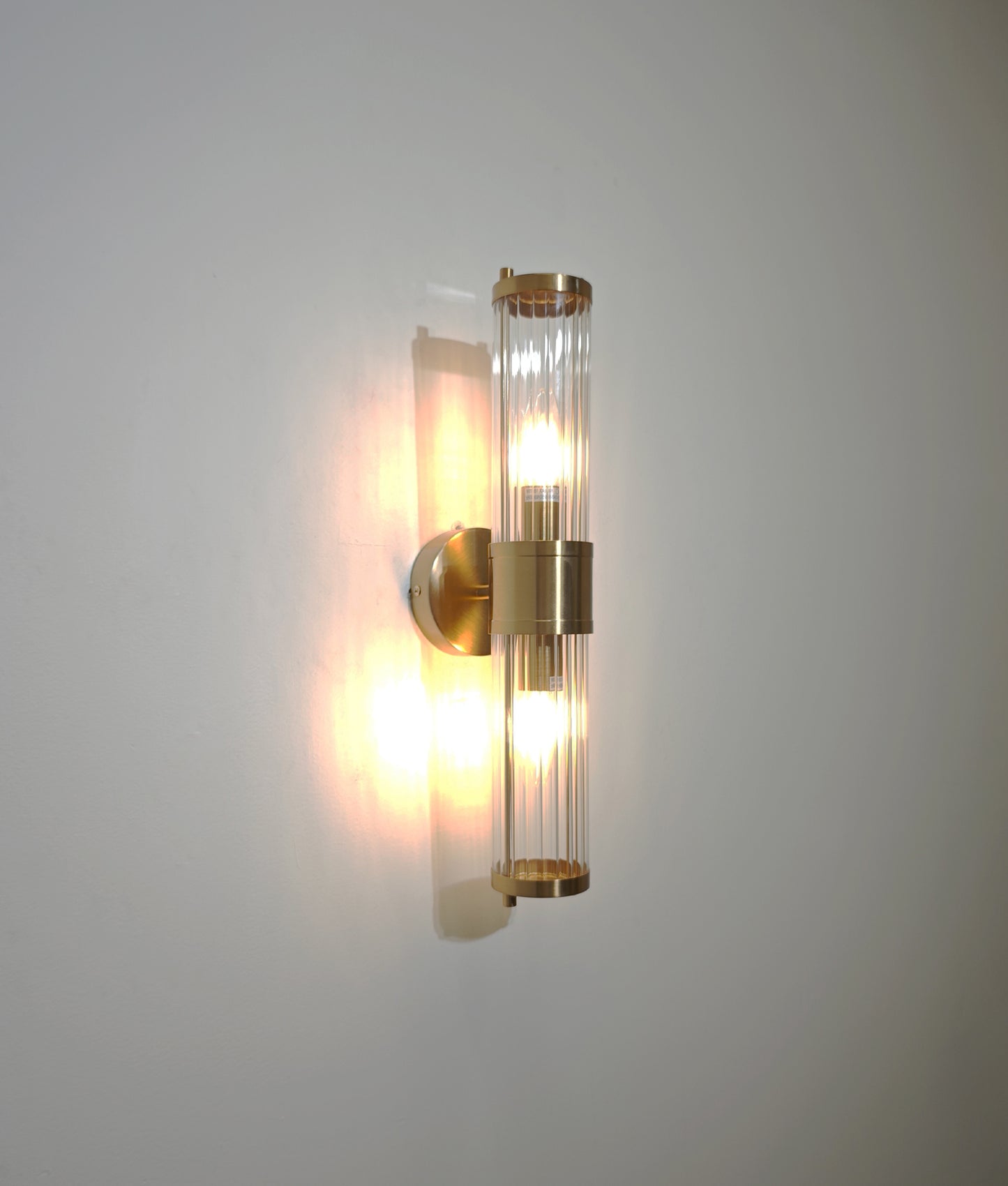 TIEMPO: Interior Up/Down Tubular Clear Glass Wall Lights