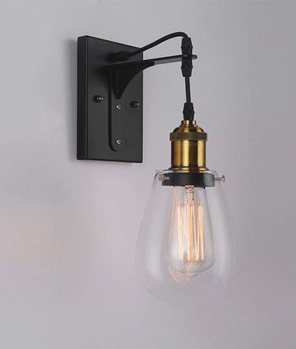 STRUNG: Interior Decorative Black / Antique Brass and Clear Pear Shape Glass Wall Light